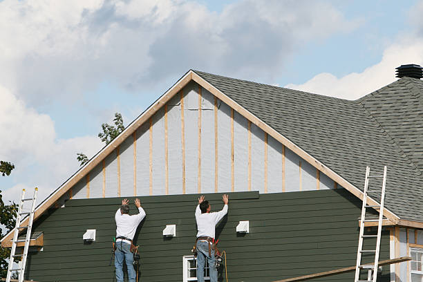 Professional Siding Installation technician working in Reva, VA